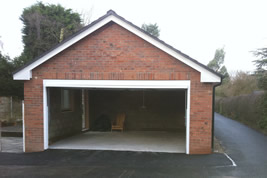 Detached garage to side of house in Wilmslow by KJB Builders